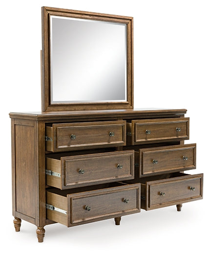 Sturlayne Queen Upholstered Panel Bed with Mirrored Dresser